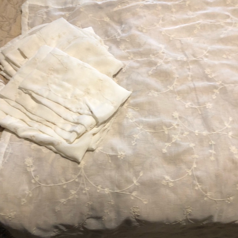 Floral embroidered curtains , rod packet, 3 panels